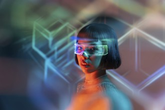 A Latin woman wearing futuristic virtual reality glasses explores a digital world. The colorful