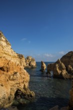 Coastal landscape with colourful rocks, Ponta da Piedade, Lagos, Algarve, Portugal