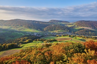 View from the Gisliflue of an autumnal forest with the Jura foothills behind, Talheim, Canton,