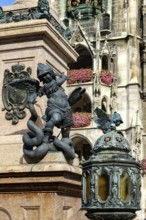 Depiction of allegorical battles against monsters, sculptures at the foot of St Mary's Column, with