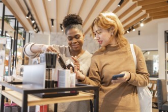 Two women in a bright cosmetics store share a friendly interaction while exploring makeup products.
