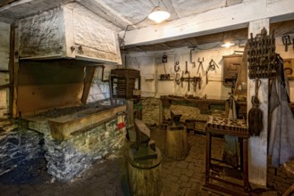 Workshop of a smithy, historical smithy from Selters, inside, Hessenpark Open-Air Museum,