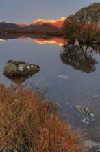 Mountains reflected in lake, morning light, morning mood, still, autumn, snowy, Lochan na