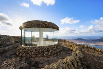 Stairway and viewing platform at the Mirador del Río viewpoint, in the evening light with sun