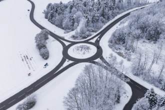 Aerial view of a roundabout in winter surroundings, Gechingen, Calw district, Germany