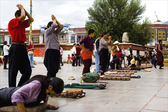 People Bow before the Jokhang Temple