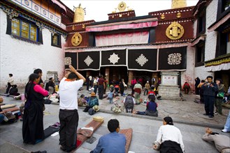 People Bow before the Jokhang Temple