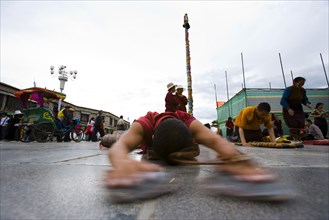 People Bow before the Jokhang Temple