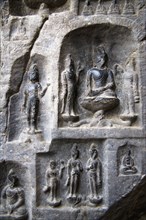 China,Henan Province,Luoyang,Buddhist sculpture at Longmen Grottoes