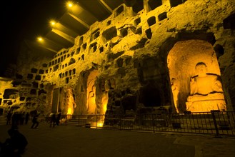 China,Henan Province,Luoyang,Buddhist sculpture at Longmen Grottoes