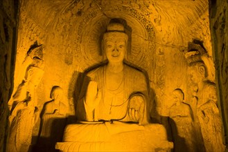 China,Henan Province,Luoyang,Buddhist sculpture at Longmen Grottoes