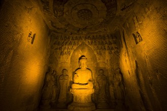 China,Henan Province,Luoyang,Buddhist sculpture at Longmen Grottoes