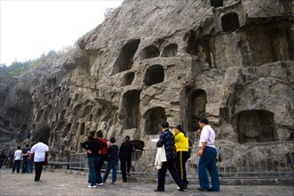 China,Henan Province,Luoyang,Buddhist sculpture at Longmen Grottoes