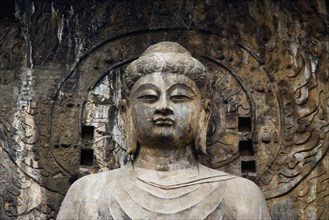 China,Henan Province,Luoyang,Buddhist sculpture at Longmen Grottoes