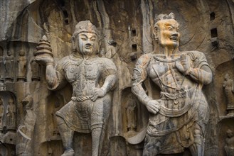 China,Henan Province,Luoyang,Buddhist sculpture at Longmen Grottoes