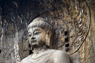 China,Henan Province,Luoyang,Buddhist sculpture at Longmen Grottoes