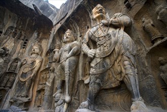 China,Henan Province,Luoyang,Buddhist sculpture at Longmen Grottoes