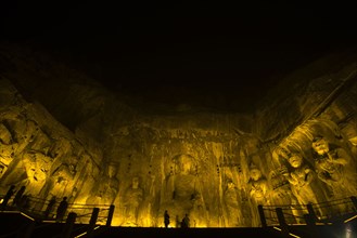 China,Henan Province,Luoyang,Buddhist sculpture at Longmen Grottoes