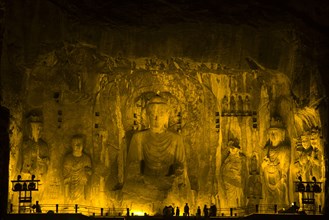 China,Henan Province,Luoyang,Buddhist sculpture at Longmen Grottoes