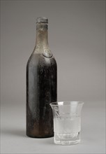 Cognac bottle and glass goblet