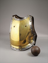 Breastplate of a cavalry soldier and canonball