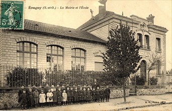The town hall and the school of Eragny