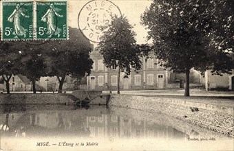 Mige,
Etang et mairie