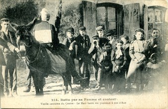 Vieille coutume du centre de la France : le mari battu est promené à dos d'âne