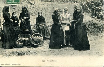Corsican women dressed in traditional costume