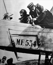World War I. Poet-aviator d'Annunzio preparing to fly over Trente