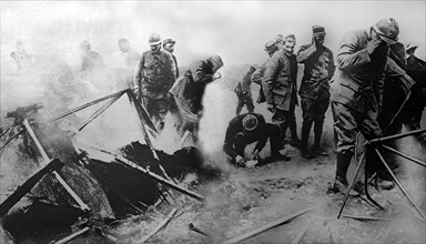 World War I. A German aviator allemand burned in the debris of his airplane, shot down near Verdun