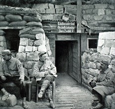 World War I. French firemen in front of a German underground post in Carency