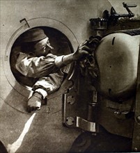 World War I. A man in the bore of a 400-mm gun