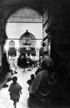 Fez: a courtyard of the great Karaouine mosque (1925)