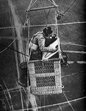 World War I. The observer of a captive hot-air ballon called "Sausage" phoning in his observations (1917)