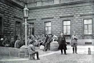 Russian Revolution. A group of bourgeois in front of the Marie  Palace in Petrograd (1918)