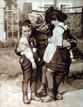 World War I. In Alsace, a soldier playing with young Alsacians (1915)