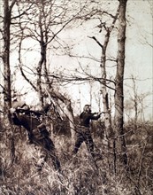 World War I. A dragoon on reconnaissance, photographed just as he is shot in the shoulder