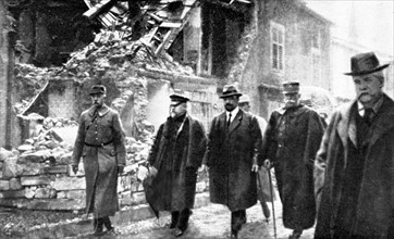 World War I. French President Raymond Poincaré visiting the town of Pont-à-Mousson which underwent 178 bombardments (1915)