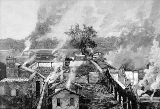 Maisons incendiées par les Chinois autour de la légation américaine pendant la Guerre des Boxers (1900)