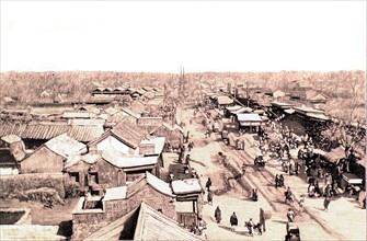 Une rue de la ville tartare à Pékin, en 1900