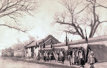 The Italian legation guarded bu Chinese soldiers in Peking, 1900