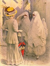 European and Arab women, in a street of Algiers (1910)