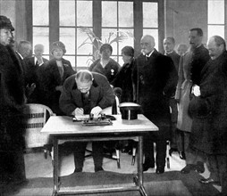 Inauguration in Paris of the French Nurses' Home, by President of the Republic. Mr Doumergue signing the visitor's book, in 1928.