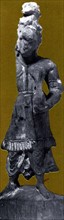 Carved wooden statuette, traces of polychromy