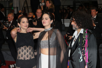 Marion Cotillard (in custom Chanel), Bertrand Mandico, Noémie Merlant (in custom Louis Vuitton)