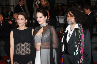 Marion Cotillard (in custom Chanel), Bertrand Mandico, Noémie Merlant (in custom Louis Vuitton)