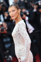 Bella Hadid (Schiaparelli dress by Daniel Roseberry) attends the "La Bataille De Gaulle: L'Âge De