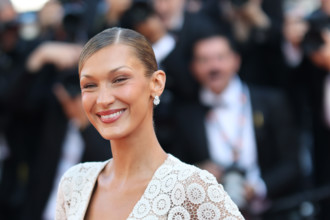 Bella Hadid (Schiaparelli dress by Daniel Roseberry) attends the "La Bataille De Gaulle: L'Âge De
