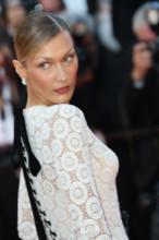 Bella Hadid (Schiaparelli dress by Daniel Roseberry) attends the "La Bataille De Gaulle: L'Âge De